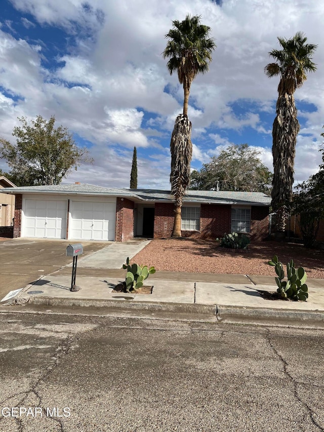 ranch-style home with a garage