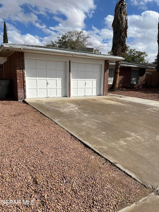 exterior space with a garage