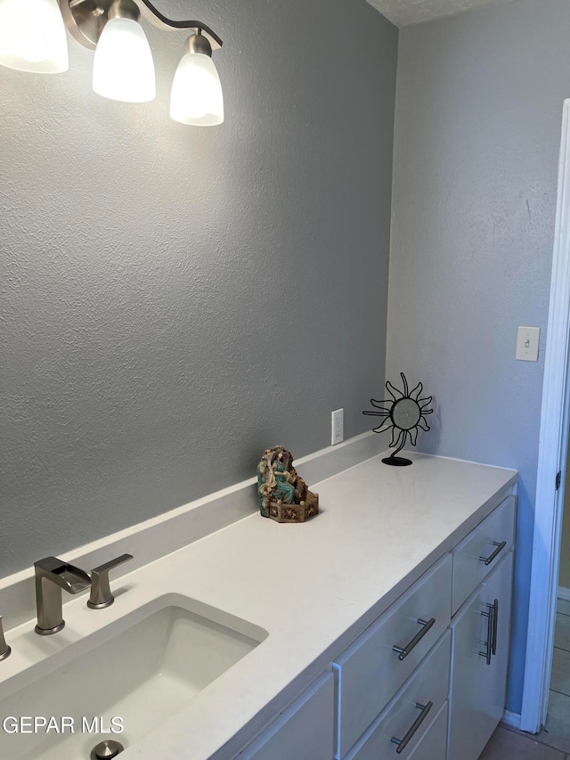 bathroom featuring vanity and tile patterned floors