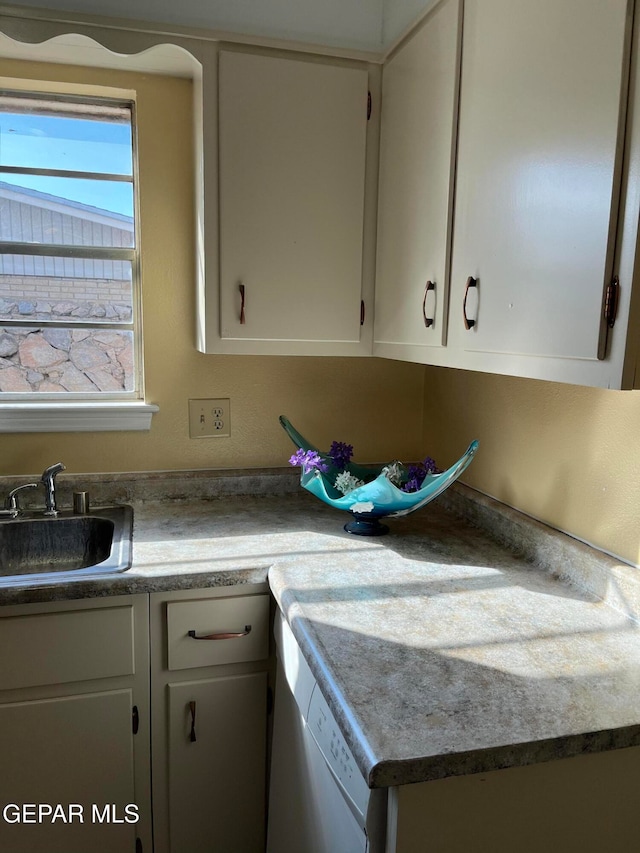 laundry area with sink