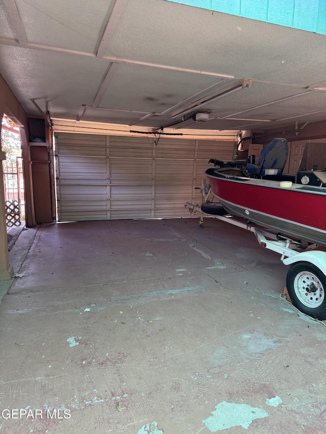 garage featuring a carport