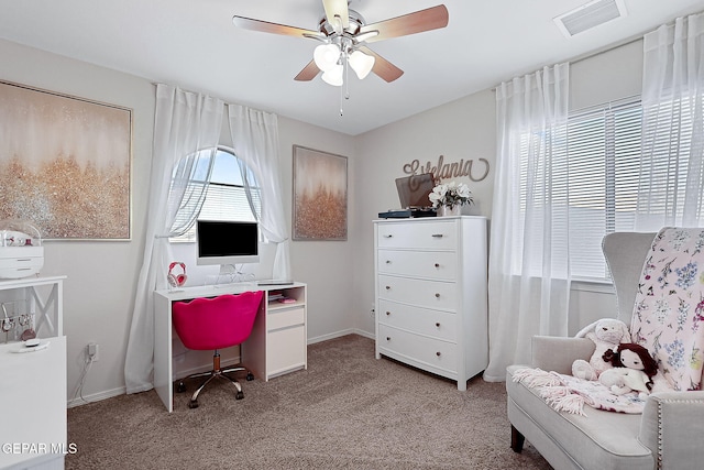 office with light colored carpet and ceiling fan