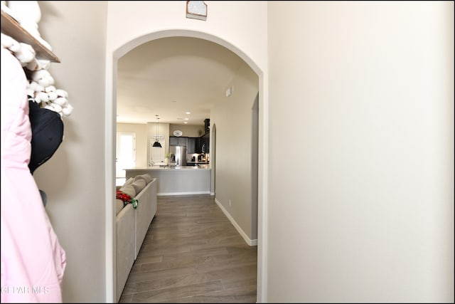 corridor featuring hardwood / wood-style flooring