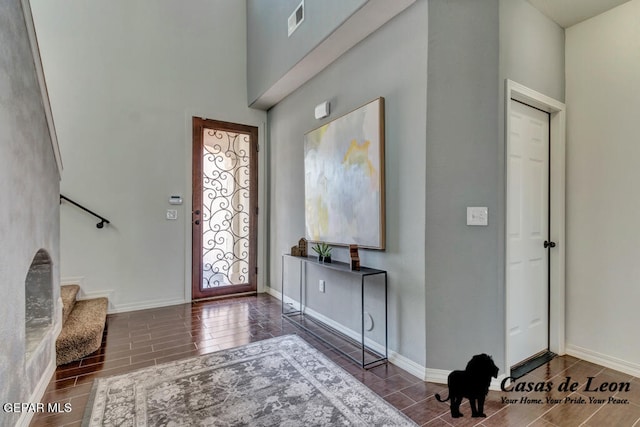 entryway featuring dark wood-type flooring