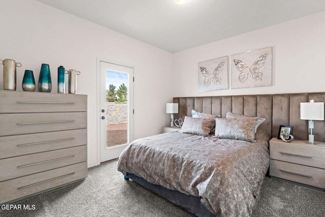 bedroom with light colored carpet and access to exterior