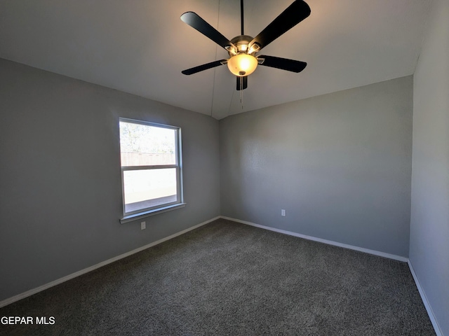 empty room with carpet floors and ceiling fan