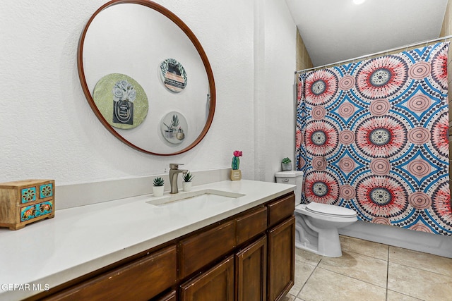 12196 Dos Rios Dr, El Paso, TX 79936 - bathroom featuring tile patterned flooring, vanity, and toilet