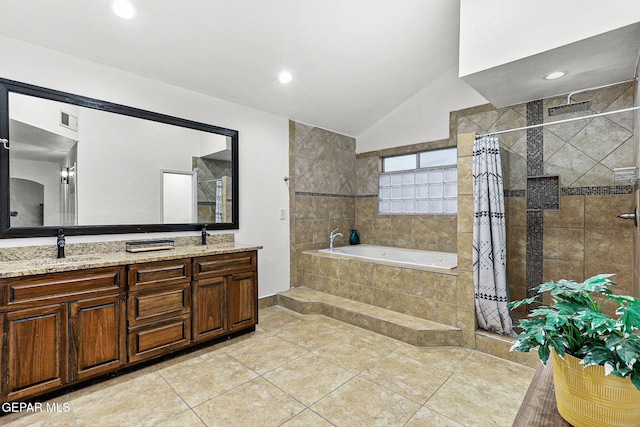 12196 Dos Rios Dr, El Paso, TX 79936 - bathroom featuring vanity, vaulted ceiling, tile patterned floors, and separate shower and tub
