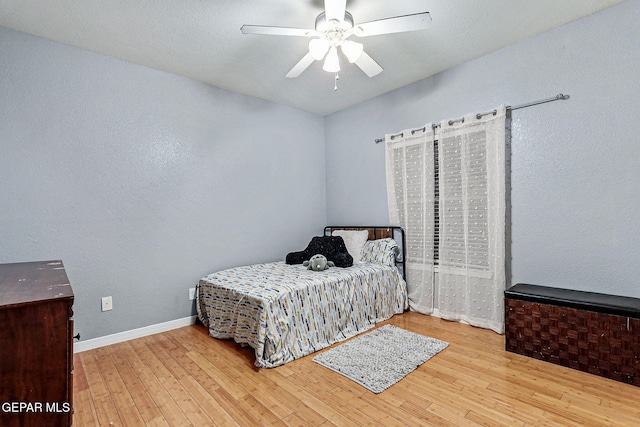 12196 Dos Rios Dr, El Paso, TX 79936 - bedroom with light hardwood / wood-style floors and ceiling fan