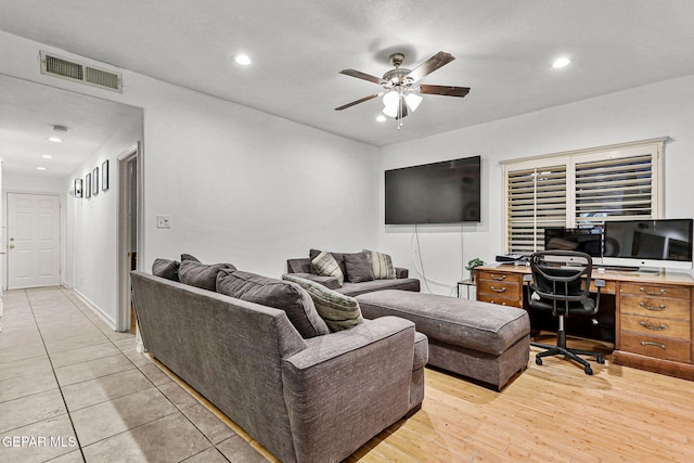 12196 Dos Rios Dr, El Paso, TX 79936 - living room with ceiling fan and light wood-type flooring