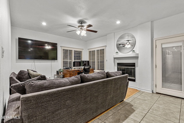 12196 Dos Rios Dr, El Paso, TX 79936 - tiled living room featuring ceiling fan