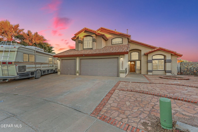 view of front of property featuring a garage