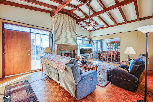 living room featuring a fireplace, beam ceiling, light parquet floors, and high vaulted ceiling