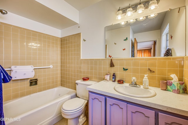 full bathroom featuring vanity, toilet, and tile walls