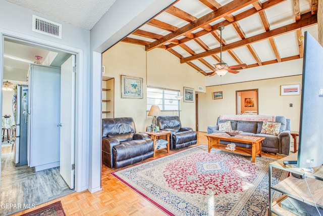 living room with light parquet flooring, lofted ceiling with beams, and ceiling fan