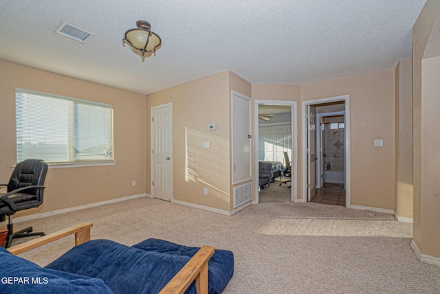 interior space featuring a textured ceiling