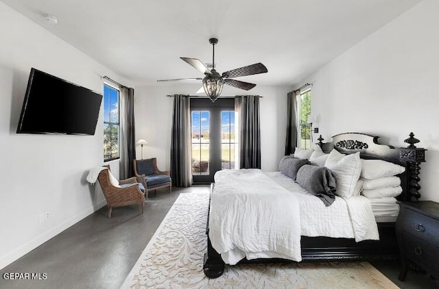 bedroom featuring concrete flooring and ceiling fan