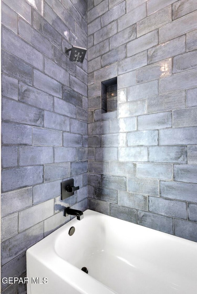 bathroom featuring bathtub / shower combination