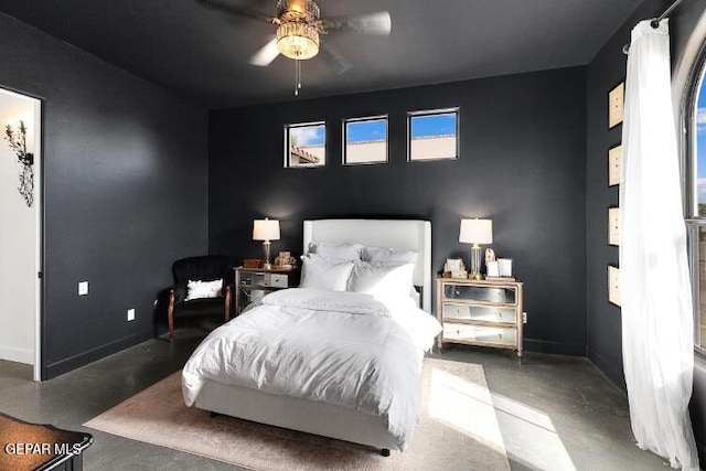 bedroom featuring concrete flooring and ceiling fan