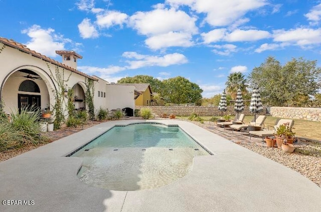 view of pool featuring a patio area