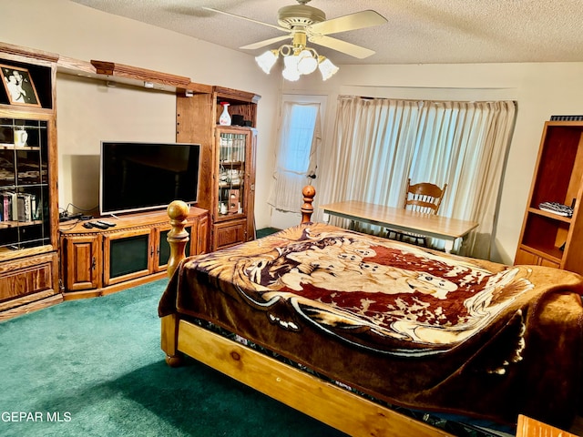 bedroom with ceiling fan, a textured ceiling, and carpet floors