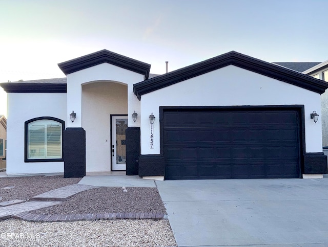 view of front of property featuring a garage