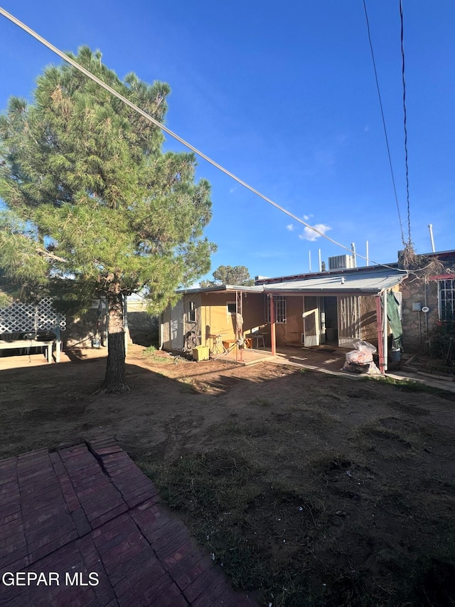 rear view of house featuring a patio area