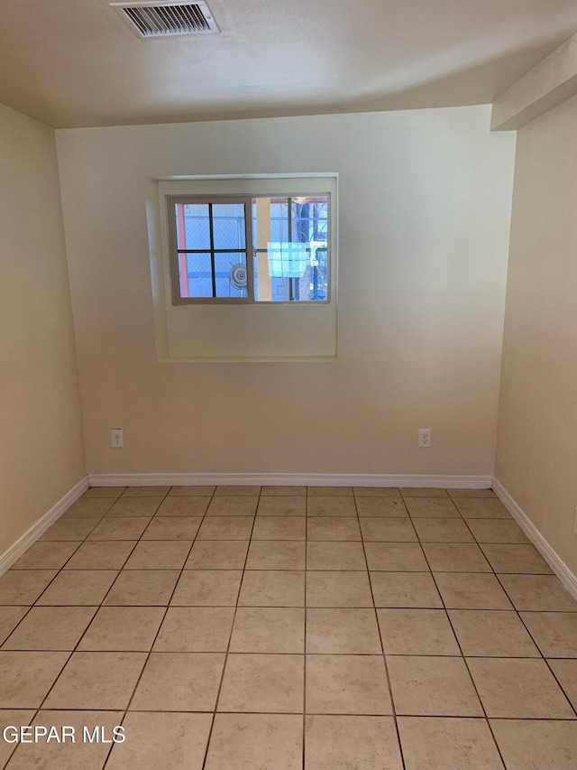 view of tiled empty room