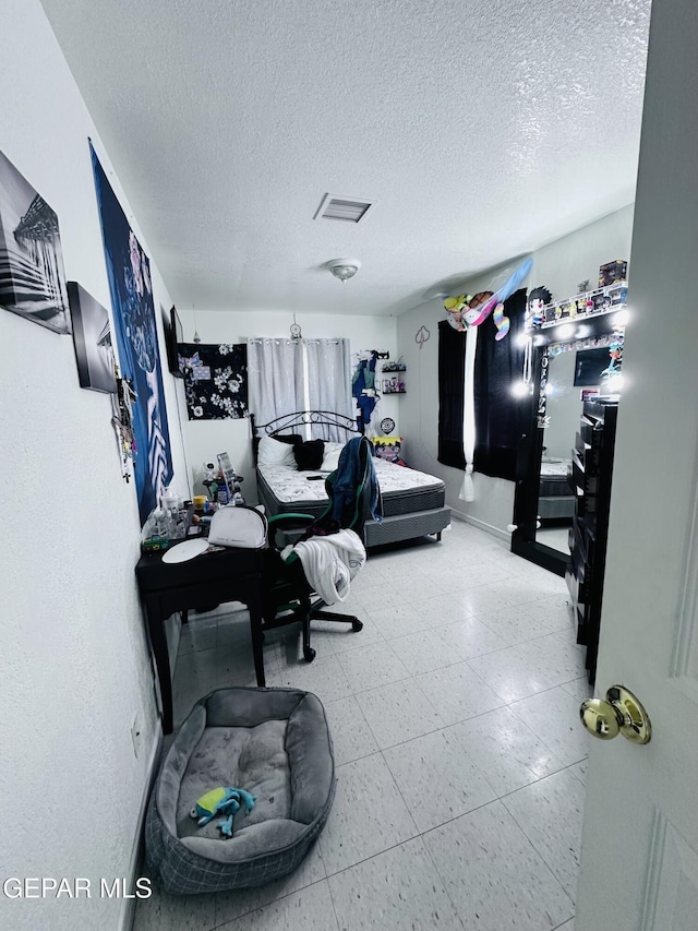 7120-7122 Second St, Canutillo, TX 79835 - home office featuring a textured ceiling and baseboards