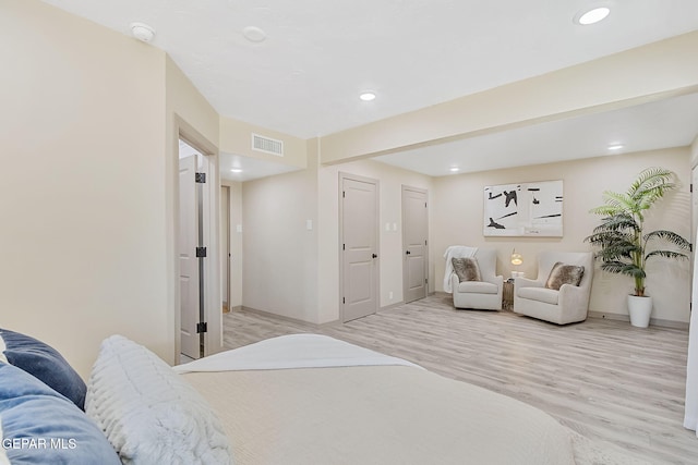 bedroom with light hardwood / wood-style flooring