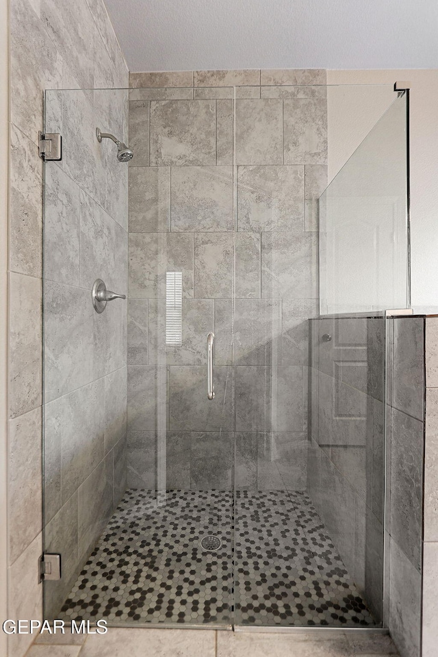 bathroom with an enclosed shower