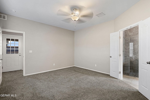 unfurnished bedroom featuring carpet and ceiling fan