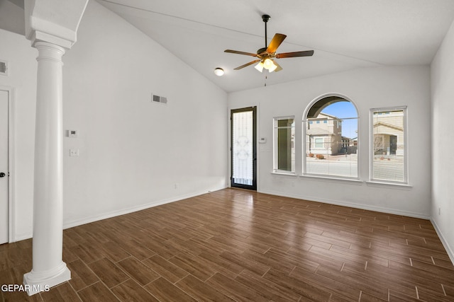 unfurnished room with dark hardwood / wood-style flooring, ceiling fan, lofted ceiling, and ornate columns