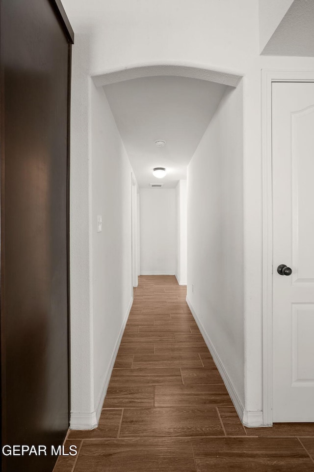 hall featuring dark hardwood / wood-style floors