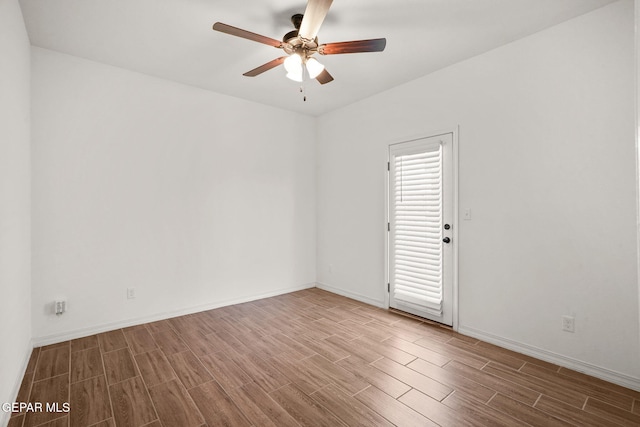 spare room featuring ceiling fan and wood-type flooring