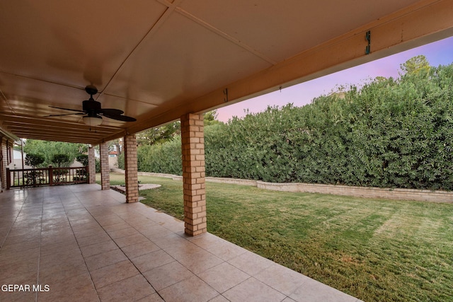 view of patio / terrace featuring ceiling fan