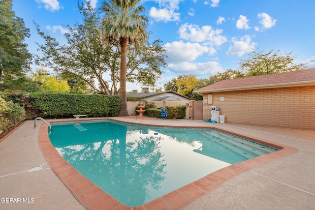 view of pool featuring a patio area