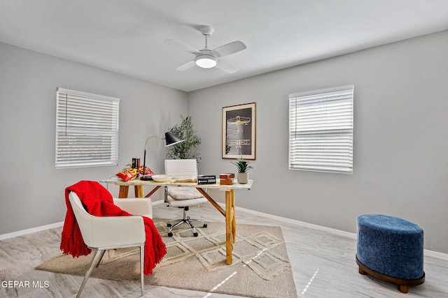 office area with ceiling fan