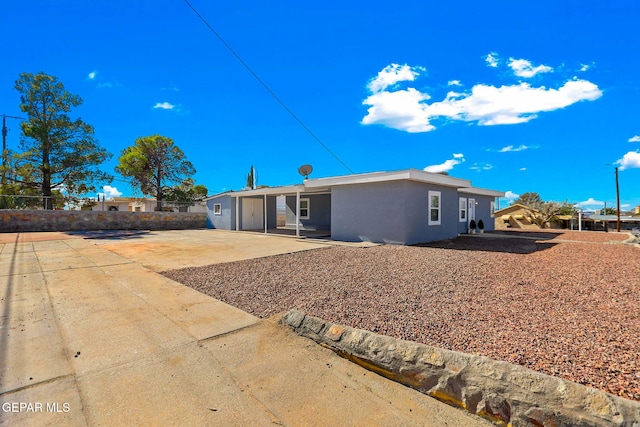 rear view of house featuring a patio