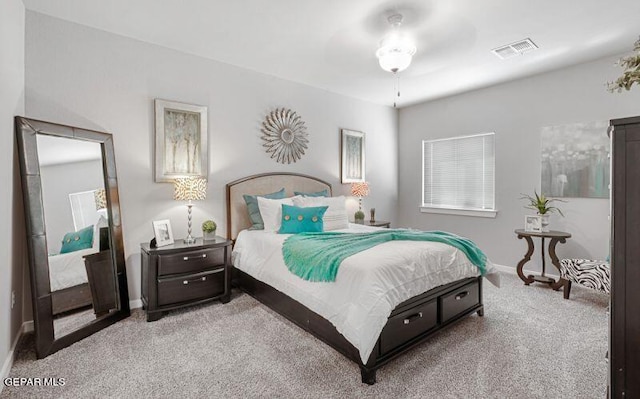 bedroom with light colored carpet