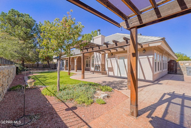 exterior space with a pergola