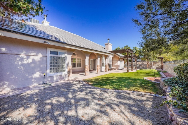 view of yard with a pergola and a patio