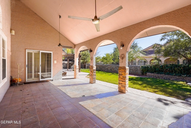 view of patio featuring ceiling fan