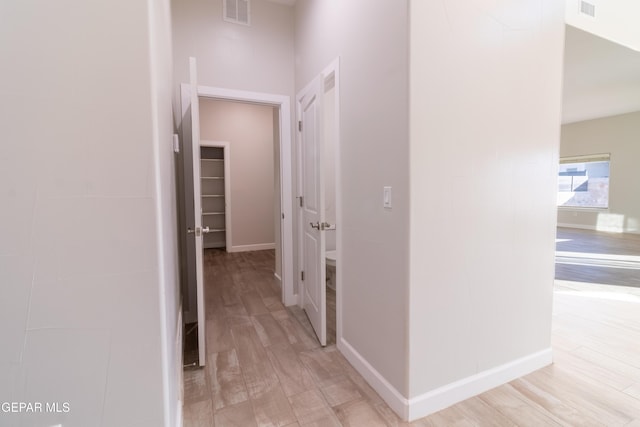 hallway featuring light hardwood / wood-style floors