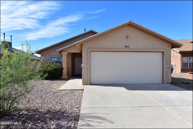 single story home with a garage