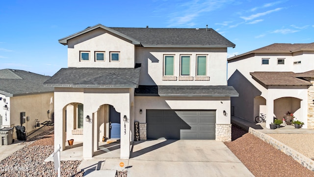 view of front of home with a garage