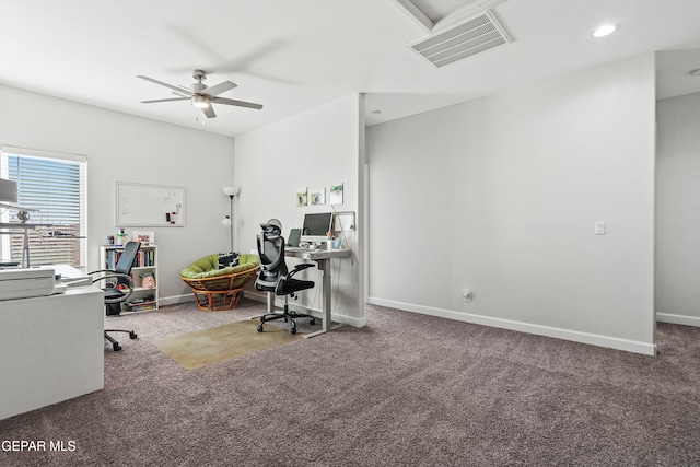 carpeted office space with ceiling fan