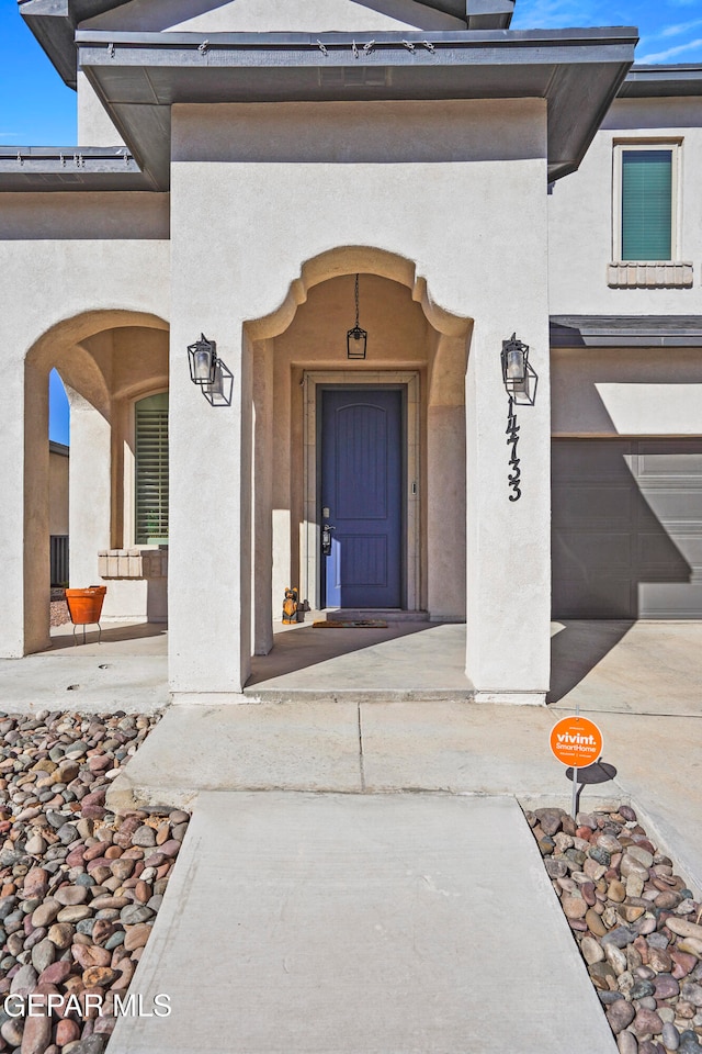 entrance to property with a garage