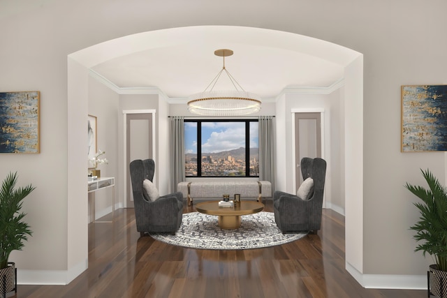 living area with dark wood-type flooring and crown molding