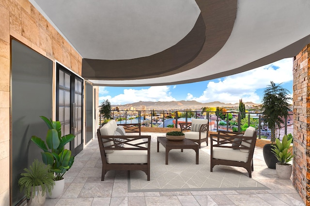 view of patio / terrace with a mountain view